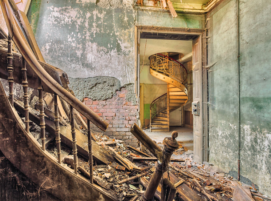 decay spiral staircase in door frame