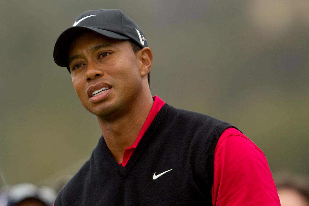 June. 20, 2010; Pebble Beach, CA, USA; Tiger Woods reacts after hitting his shot on the 17th hole during the Fourth Round of the 110th U.S. Open at Pebble Beach Golf Links. (Photo by ALLAN HENRY / GOLF CHRONICLES)