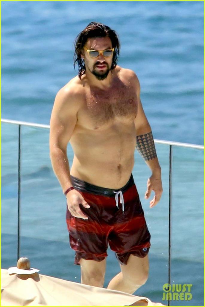 *EXCLUSIVE* Rio de Janeiro, Brazil - Jason Momoa enjoys a laid back day in Rio de Janeiro where he lounged around at the pool with a couple of friends. The actor kept cool in the water while talking to his buddies and then later hit the beach, where he walked around with who appears to be his bodyguard. Jason showed off his muscles wearing just his swim shorts with no shirt. It has been reported recently that Jason has signed up to play Aquaman in four films and can be seen in "Batman v Superman: Dawn of Justice" in 2016. AKM-GSI December 9, 2014 To License These Photos, Please Contact : Steve Ginsburg (310) 505-8447 (323) 423-9397 steve@akmgsi.com sales@akmgsi.com or Maria Buda (917) 242-1505 mbuda@akmgsi.com ginsburgspalyinc@gmail.com