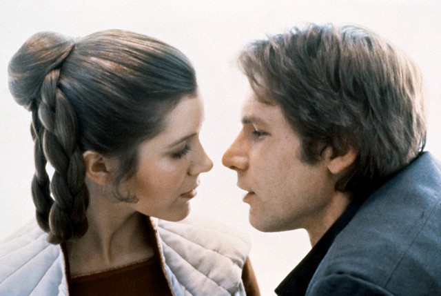1980 --- American actors Carrie Fisher and Harrison Ford on the set of Star Wars: Episode V - The Empire Strikes Back directed by Irvin Kershner. --- Image by © Lucasfilm/Sunset Boulevard/Corbis