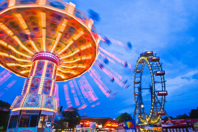 29 May 2007, Vienna, Austria --- Amusement Ride and Riesenrad at Prater Amusement Park --- Image by © Atlantide Phototravel/Corbis