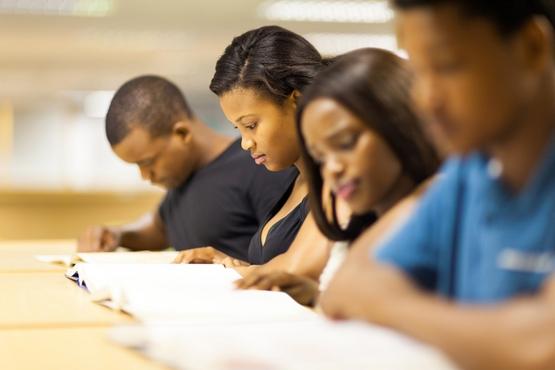 students_studying_in_library