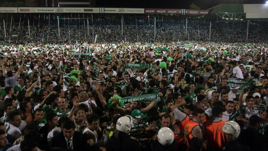 BURSA, TURKEY - MAY 16: Bursaspor fans celebrate after winning the Turkish Super League soccer match against Besiktas at Ataturk Stadium on May 16, 2010 in Bursa, Turkey. (Photo by Mustafa Ozer/EuroFootball/Getty Images)