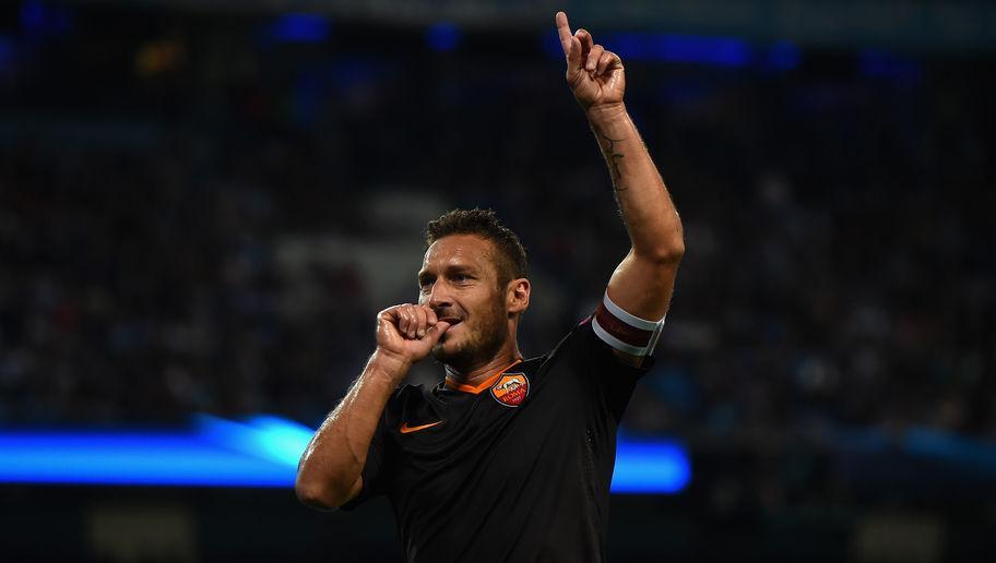 MANCHESTER, ENGLAND - SEPTEMBER 30: Francesco Totti of AS Roma celebrates scoring his team's first goal during the UEFA Champions League Group E match between Manchester City FC and AS Roma on September 30, 2014 in Manchester, United Kingdom. (Photo by Laurence Griffiths/Getty Images)