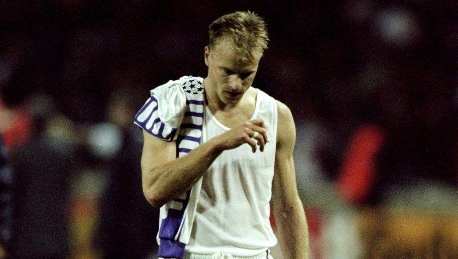 27 Oct 1999: Dennis Bergkamp of Arsenal leaves the field in despair following the UEFA European Champions League Group B match against Fiorentina played at Wembley Stadium, London. The game finished in a 1-0 away win for Fiorentina and saw the elimination of Arsenal from the second phase. Mandatory Credit: Alex Livesey /Allsport