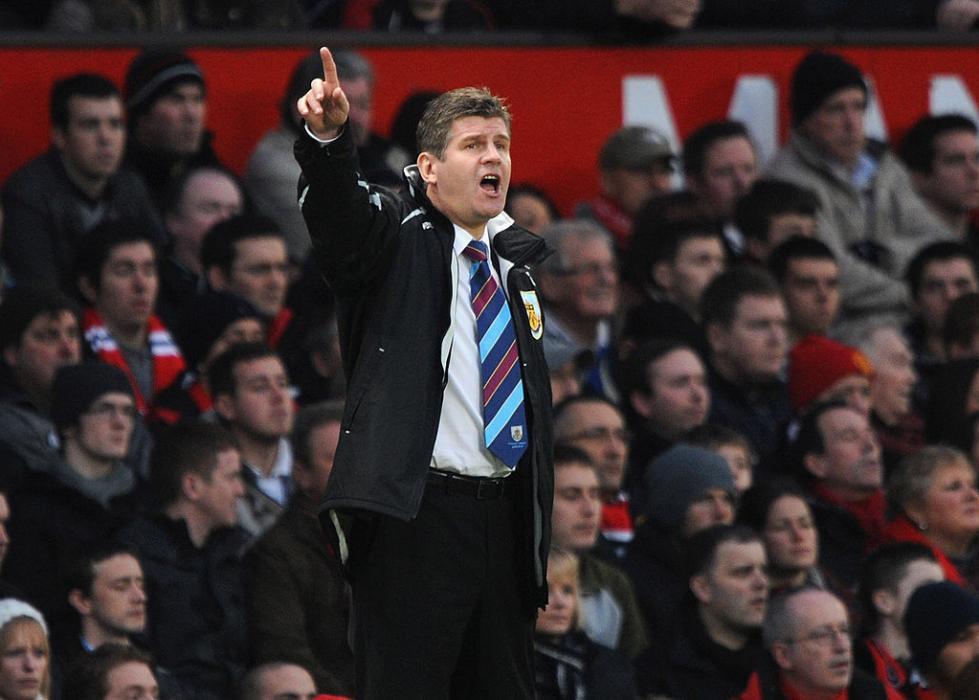 MANCHESTER, ENGLAND - JANUARY 16:  Brian Laws of Burnley takes charge of his first gam as new manager during the Barclays Premier League Match between Manchester United and Burnley at Old Trafford on January 16, 2010 in Manchester, England.  (Photo by Laurence Griffiths/Getty Images)