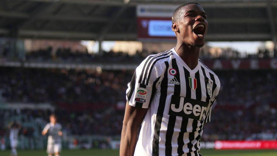 Juventus' midfielder Paul Pogba from France celebrates after a goal of teammate Juventus' forward Alvaro Morata from Spain during the Italian Serie A football match Torino Vs Juventus on March 20, 2016 at the "Olympic Stadium" in Turin.  / AFP / MARCO BERTORELLO        (Photo credit should read MARCO BERTORELLO/AFP/Getty Images)