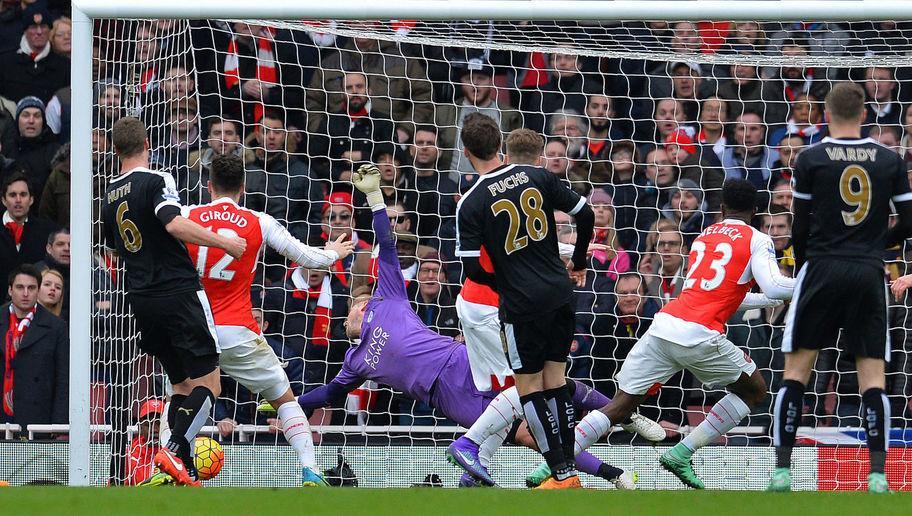 Arsenal's English striker Danny Welbeck (2R) scores his team's second goal during the English Premier League football match between Arsenal and Leicester at the Emirates Stadium in London on February 14, 2016.  / AFP / GLYN KIRK / RESTRICTED TO EDITORIAL USE. No use with unauthorized audio, video, data, fixture lists, club/league logos or 'live' services. Online in-match use limited to 75 images, no video emulation. No use in betting, games or single club/league/player publications.  /         (Photo credit should read GLYN KIRK/AFP/Getty Images)