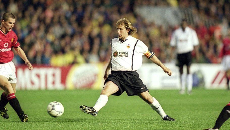 14 Feb 2001: Gaizka Mendieta of Valencia finds a route to goal during the UEFA Champions League Group A match against Manchester United played at the Mestalla Stadium, in Valencia, Spain. The match ended in a 0-0 draw. Mandatory Credit: Gary M Prior/Allsport