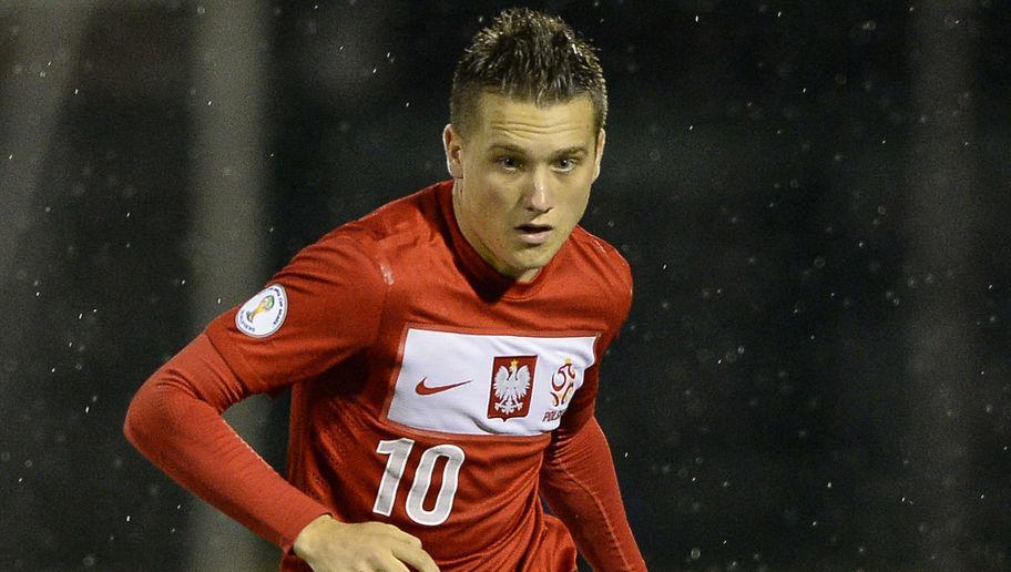 Poland's midfielder Piotr Zielinski controls the ball during the FIFA World Cup 2014 qualifying football match, San Marino vs Poland on September 10, 2013 at Olympic stadium in San Marino. AFP PHOTO / ANDREAS SOLARO (Photo credit should read ANDREAS SOLARO/AFP/Getty Images)