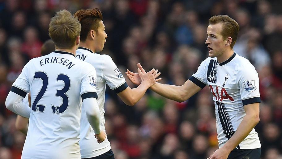 Tottenham Hotspur's English striker Harry Kane (R) celebrates with Tottenham Hotspur's South Korean striker Son Heung-Min after scoring thier first goal during the English Premier League football match between Liverpool and Tottenham Hotspur at Anfield in Liverpool, north west England on April 2, 2016. / AFP / Paul ELLIS / RESTRICTED TO EDITORIAL USE. No use with unauthorized audio, video, data, fixture lists, club/league logos or 'live' services. Online in-match use limited to 75 images, no video emulation. No use in betting, games or single club/league/player publications.  /         (Photo credit should read PAUL ELLIS/AFP/Getty Images)