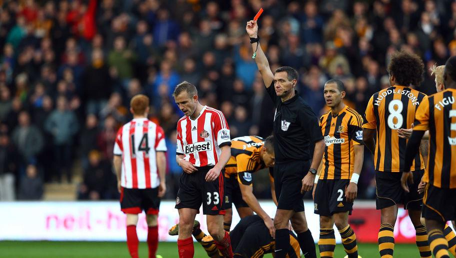 HULL, ENGLAND - NOVEMBER 02:  Lee Cattermole of Sunderland is sent off with a red card by referee Andre Marriner after a foul on Ahmed Elmohamady (down) of Hull during the Barclays Premier League match between Hull City and Sunderland at KC Stadium on November 2, 2013 in Hull, England.  (Photo by Matthew Lewis/Getty Images)