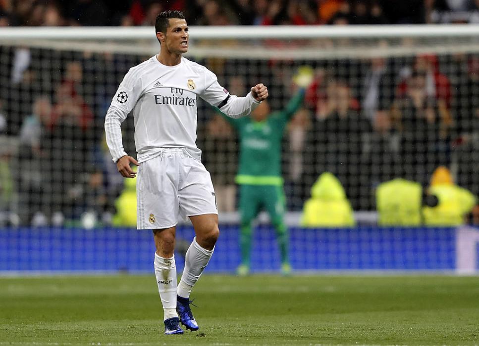 MADRID, SPAIN - APRIL 12: Cristiano Ronaldo of Real Madrid celebrates after scoring the opening goal goal during the UEFA Champions League quarter final second leg match between Real Madrid and VfL Wolfsburg at Estadio Santiago Bernabeu on April 12, 2016 in Madrid, Spain. (Photo by Angel Martinez/Real Madrid via Getty Images)