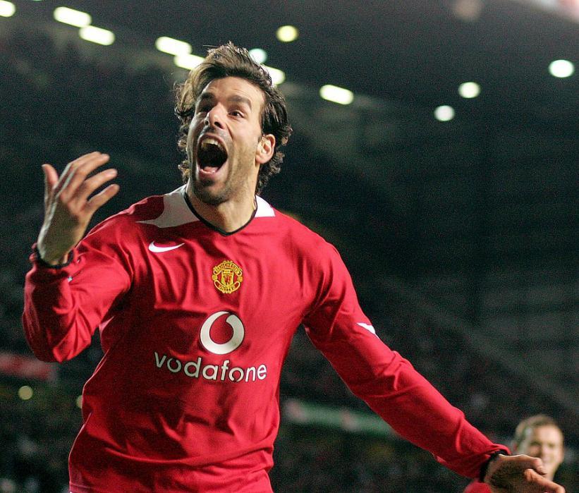 MANCHESTER, ENGLAND - JANUARY 25: Ruud van Nistelrooy of Manchester United celebrates scoring the first goal during the Carling Cup semi-final second leg match between Manchester United and Blackburn Rovers at Old Trafford on January 25 2006 in Manchester, England. (Photo by John Peters/Manchester United via Getty Images)