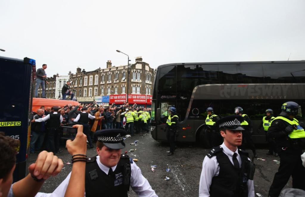 LONDON, UNITED KINGDOM - MAY 10: The Manchester United team coach attempts to make its way through the crowds prior to the Barclays Premier League match between West Ham United and Manchester United at the Boleyn Ground on May 10, 2016 in London, England. West Ham United are playing their last ever home match at the Boleyn Ground after their 112 year stay at the stadium. The Hammers will move to the Olympic Stadium for the 2016-17 season. (Photo by Paul Gilham/Getty Images)