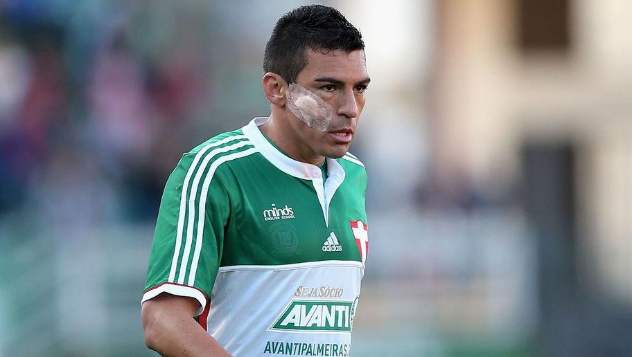 SAO PAULO, BRAZIL - JULY 20: Lucio of Palmeiras is injured during the match between Palmeiras and Cruzeiro for the Brazilian Series A 2014 at Estadio do Pacaembu on July 20, 2014 in Sao Paulo, Brazil. (Photo by Friedemann Vogel/Getty Images)