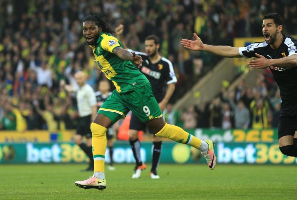 NORWICH, ENGLAND - MAY 11: Dieumerci Mbokani of Norwich City celebrates scoring his team's second goal during the Barclays Premier League match between Norwich City and Watford at Carrow Road on May 11, 2016 in Norwich, England. (Photo by Stephen Pond/Getty Images)
