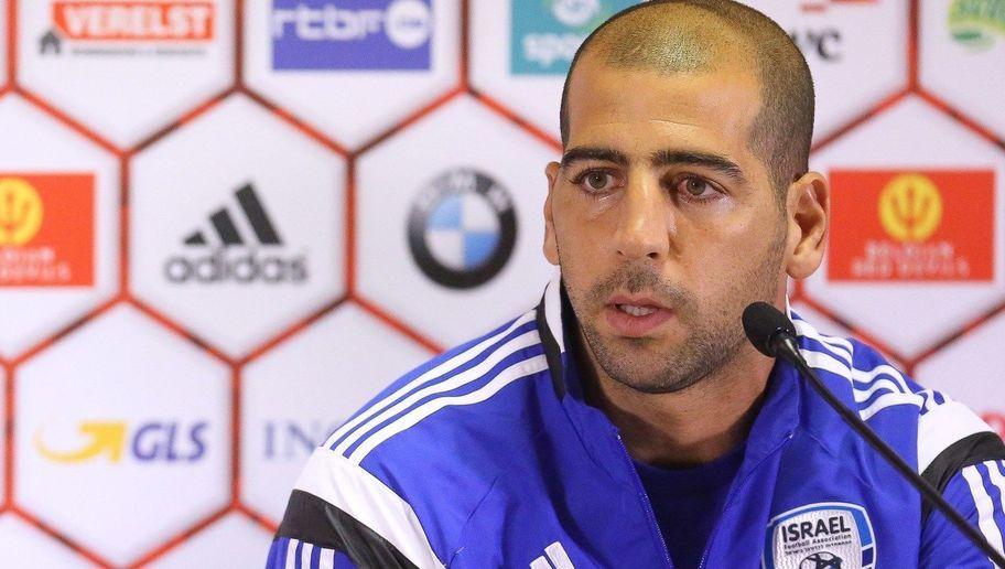 Israel's head coach Eli Guttman (L) and Israel's defender Tal Ben Haim deliver a press conference in Brussels on October 12, 2015, ahead of Israel's Euro 2016 qualifying match against Belgium. AFP PHOTO / BELGA / BRUNO FAHY --BELGIUM OUT-- (Photo credit should read BRUNO FAHY/AFP/Getty Images)