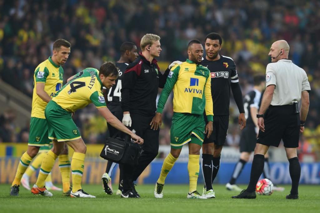 NORWICH, ENGLAND - MAY 11: Nathan Redmond of Norwich City reacts after receiving treatment during the Barclays Premier League match between Norwich City and Watford at Carrow Road on May 11, 2016 in Norwich, England. (Photo by Ross Kinnaird/Getty Images)