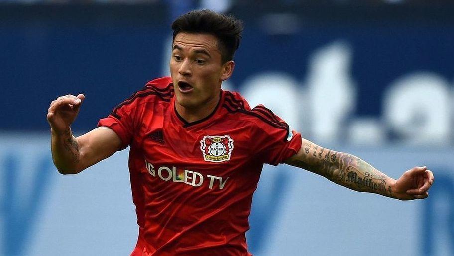 Leverkusen's midfielder Charles Aranguiz vies for the ball during the German first division Bundesliga football match between Schalke 04 and Bayer 04 Leverkusen, in the Veltins-Arena in Gelsenkirchen, western Germany, on April 23, 2016. / AFP / PATRIK STOLLARZ / RESTRICTIONS: DURING MATCH TIME: DFL RULES TO LIMIT THE ONLINE USAGE TO 15 PICTURES PER MATCH AND FORBID IMAGE SEQUENCES TO SIMULATE VIDEO. == RESTRICTED TO EDITORIAL USE == FOR FURTHER QUERIES PLEASE CONTACT DFL DIRECTLY AT + 49 69 650050 (Photo credit should read PATRIK STOLLARZ/AFP/Getty Images)