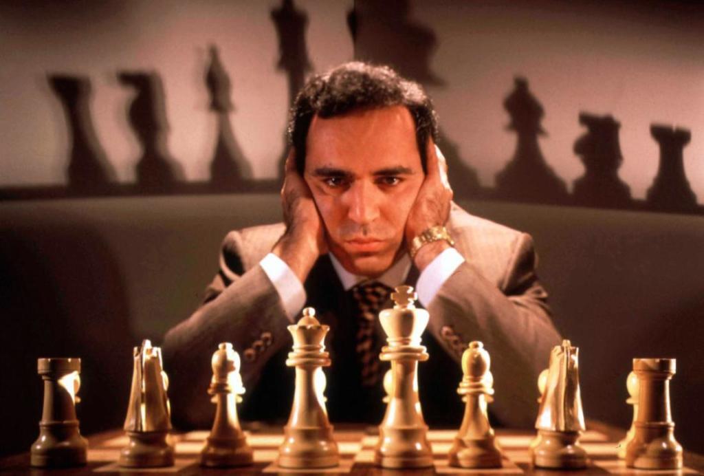 Chess champion Gary Kasparov contemplating board, training for his May rematch w. smarter version of Deep Blue, IBM computer that spooked him last yr. (Photo by Ted Thai/The LIFE Picture Collection/Getty Images)