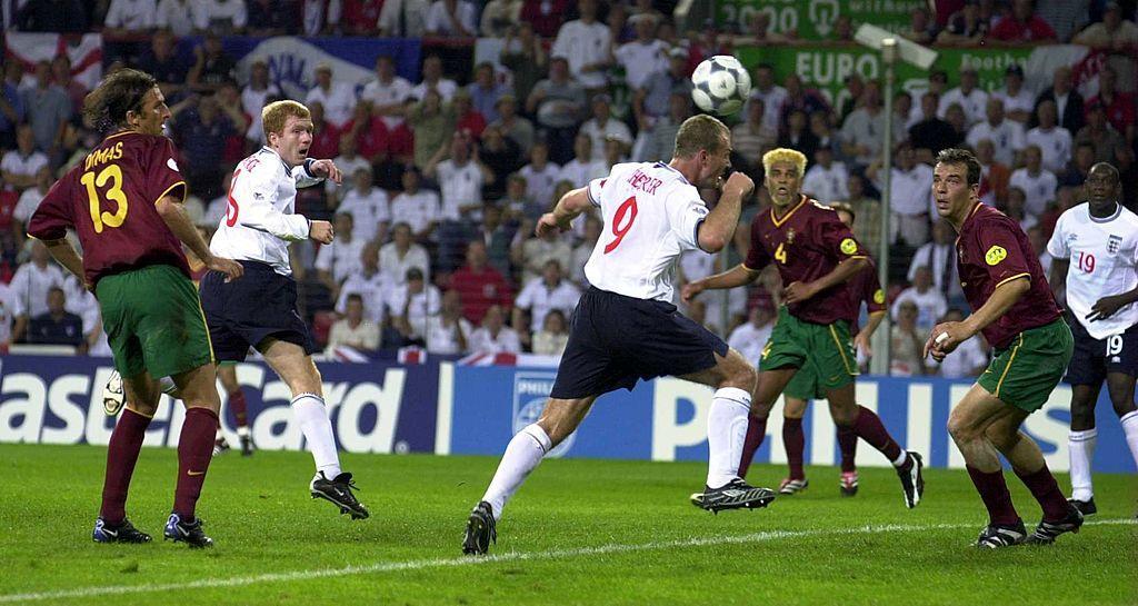 12 Jun 2000:  Paul Scholes and Alan Shearer both miss a headed chance during the England v Portugal match in Euro 2000 Group A at the Philips Stadium, Eindhoven, Holland. Mandatory Credit: Ross Kinnaird/ALLSPORT