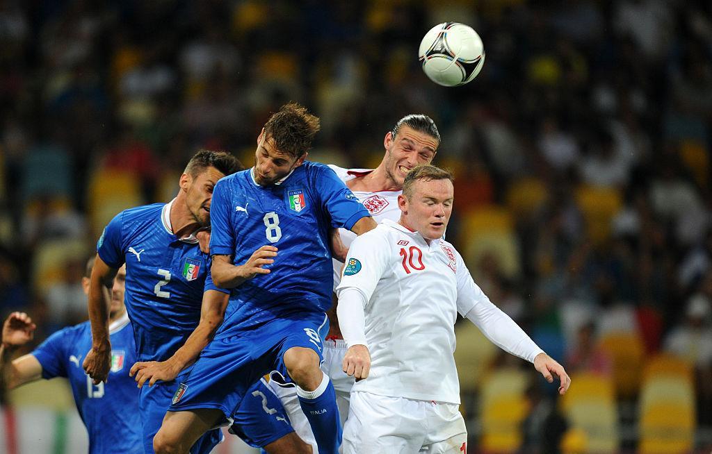 Cristian Maggio of Italy and Claudio Marchisio of Italy with Andy Carroll of England and Wayne Rooney of England (Photo by AMA/Corbis via Getty Images)