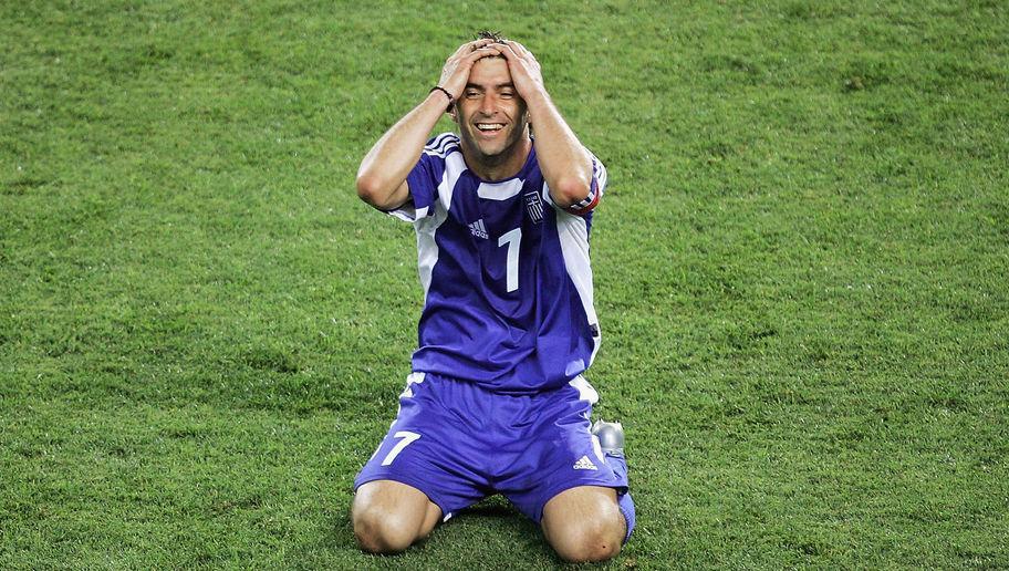 FARO, PORTUGAL - JUNE 20:  Theodoros Zagorakis of Greece celebrates his side reaching the Quarter Finals after the UEFA Euro 2004, Group A match between Russia and Greece at the Algarve Stadium, on June 20, 2004 in Faro, Portugal.  (Photo by Laurence Griffiths/Getty Images) *** Local Caption *** Theodoros Zagorakis