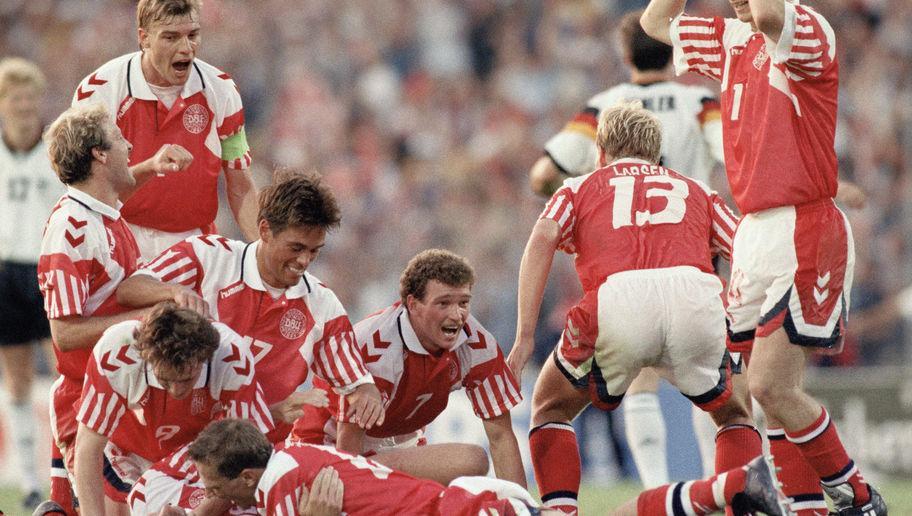GOTHENBURG, SWEDEN - JUNE 26: Kim Vilfort of Denmark is mobbed by team-mates after scoring the second and winning goal during the UEFA European Championships 1992 Final between Denmark and Germany held at the Ullevi Stadium on June 26, 1992 in Gothernburg, Sweden. (Photo by Shaun Botterill/Allsport/Getty Images)