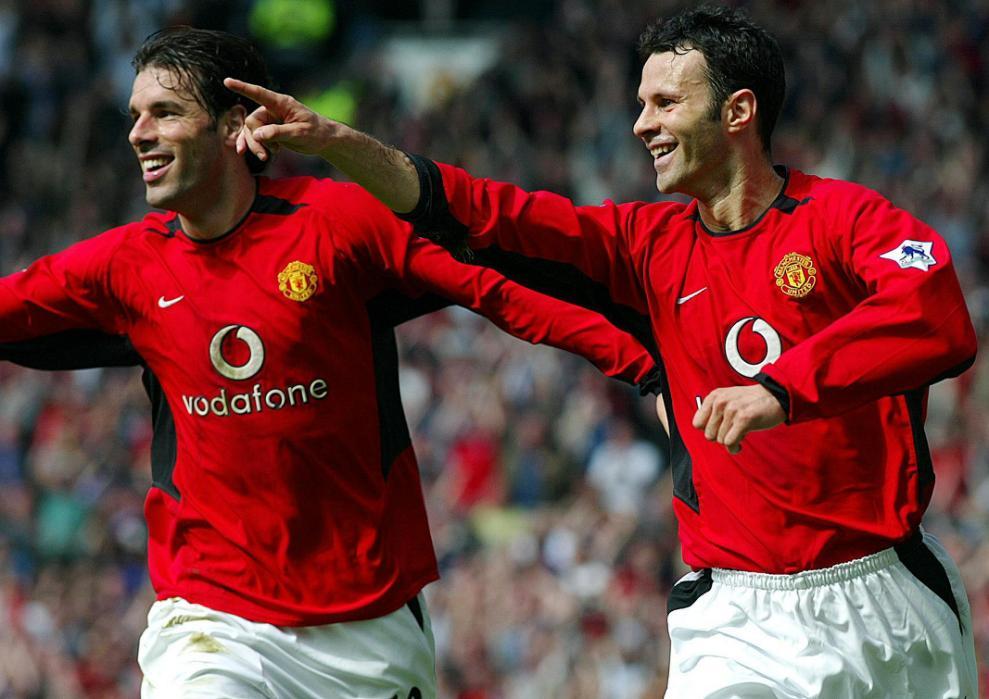 File photo dated 05-04-2003 of Manchester United's Ryan Giggs (right) celebrates l with team-mate Ruud Van Nistelrooy.