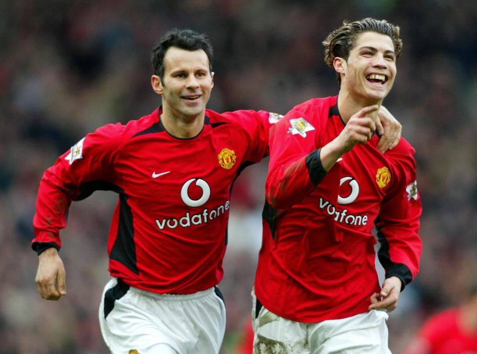 Manchester United's Cristiano Ronaldo celebrates scoring against Tottenham Hotspur with team-mate Ryan Giggs, during their Barclaycard Premiership match at Old Trafford, Manchester Stadium Saturday March 20 2004. THIS PICTURE CAN ONLY BE USED WITHIN THE CONTEXT OF AN EDITORIAL FEATURE. NO WEBSITE/INTERNET USE UNLESS SITE IS REGISTERED WITH FOOTBALL ASSOCIATION PREMIER LEAGUE.