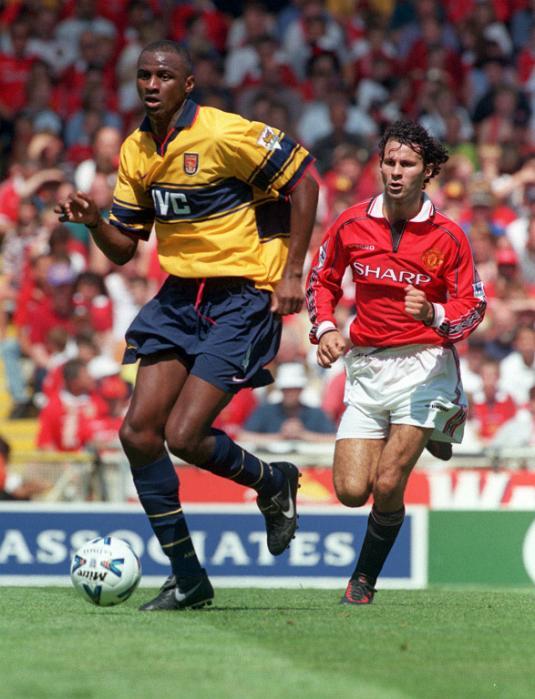 THIS PICTURE CAN ONLY BE USED WITHIN THE CONTEXT OF AN EDITORIAL FEATURE. PA NEWS 9/8/98 MANCHESTER UNITED'S RYAN GIGGS CHASES ARSENAL'S PATRICK VIEIRA DURING THE 1998 FA CHARITY SHIELD FOOTBALL MATCH BETWEEN ARSENAL AND MANCHESTER UNITED AT WEMBLEY STADIUM. ARSENAL WON THE MATCH 3-0.