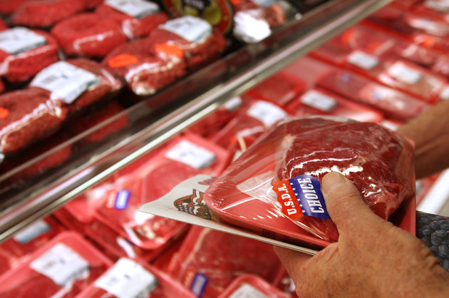 UNITED STATES - MAY 30: Helmut Sommer shops for London Broil in the meat case of a supermarket in New York, U.S., on Friday, May 30, 2008. Global beef prices are likely to rise on higher production costs, Peter Weeks, chief economist with trade group Meat & Livestock Australia, said. Farmers globally are facing higher input costs from oil to grain and fertilizer. (Photo by Daniel Acker/Bloomberg via Getty Images)