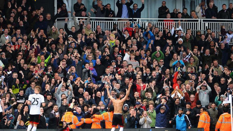 LONDON, ENGLAND - MAY 11:  Chris David of Fulham celebrates scoring his late goal with fans during the Barclays Premier League match between Fulham and Crystal Palace at Craven Cottage on May 11, 2014 in London, England.  (Photo by Christopher Lee/Getty Images)