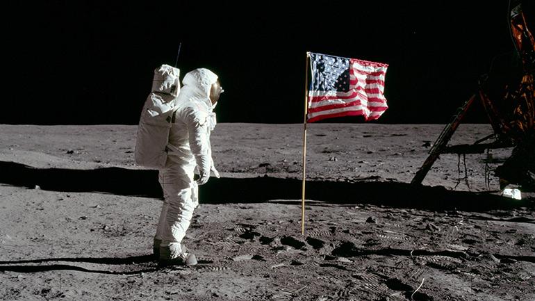 Buzz-Aldrin-Salutes-Flag[1]