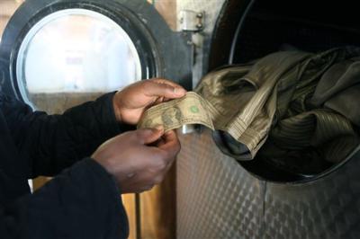 20100706__AFZimbabweMoneyLaundering2_GALLERY